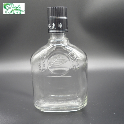 Embossed logo liquor bottle