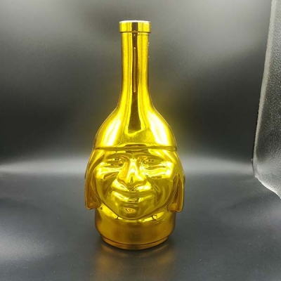 Head shape electraplated wine bottle